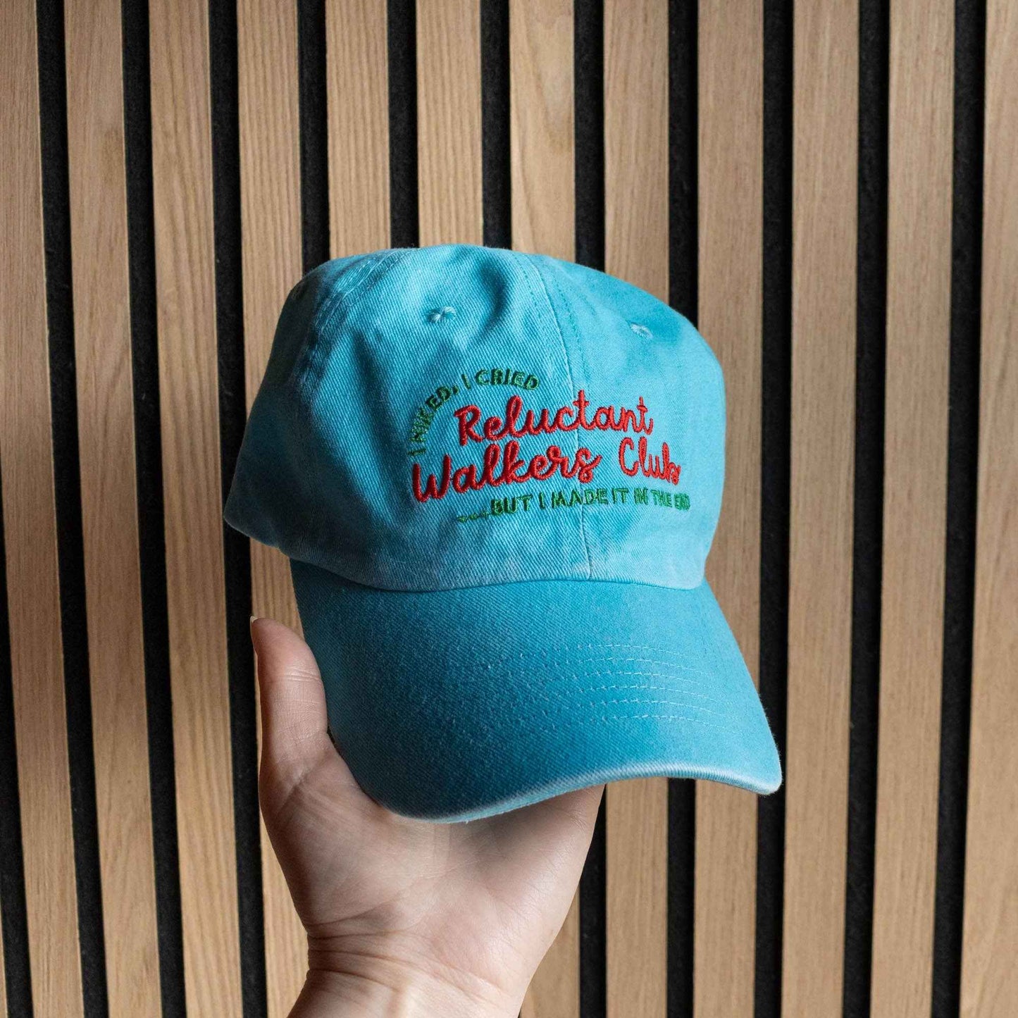 Bright embroidered text reading “I Hiked, I Cried… But I Made It,”