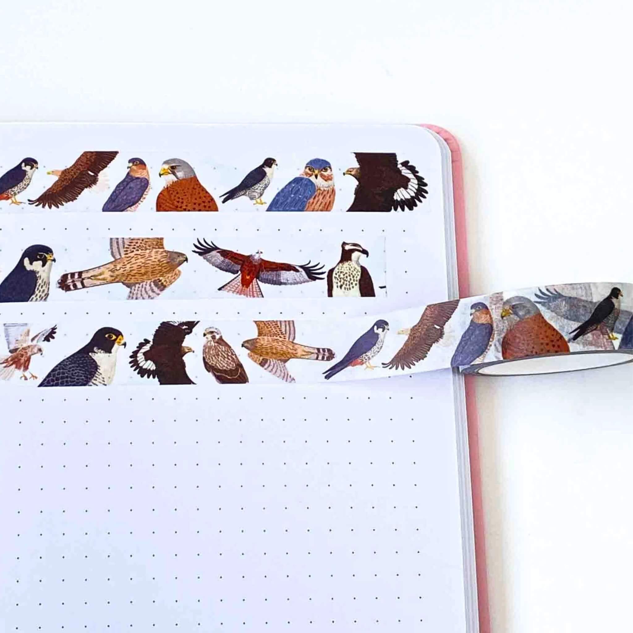 notebook with british birds of prey designs on washi tape