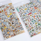 Flat lay of zero per zero illustrated sticker sheets