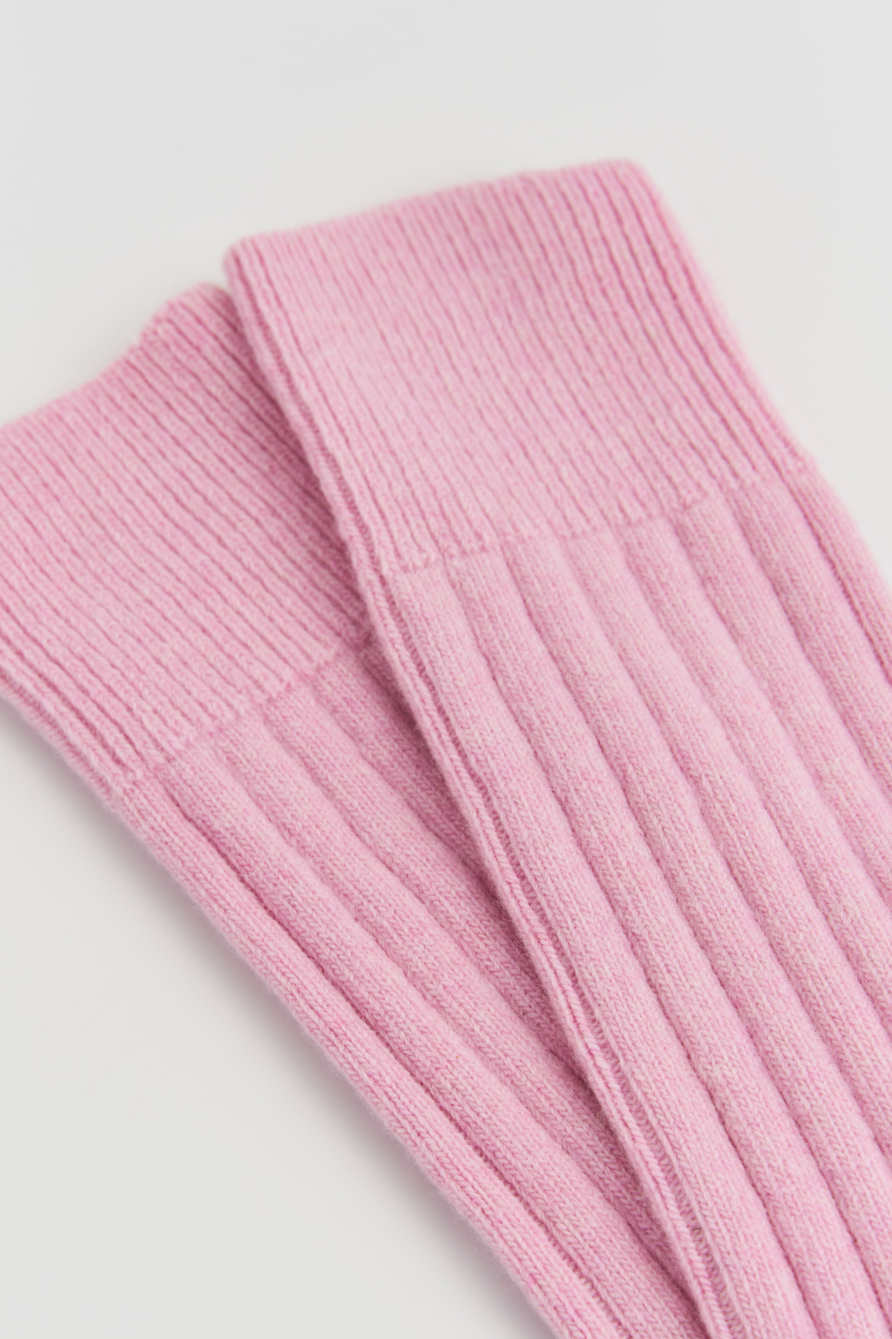 merino wool texture shown on pairs bed socks in sugar pink