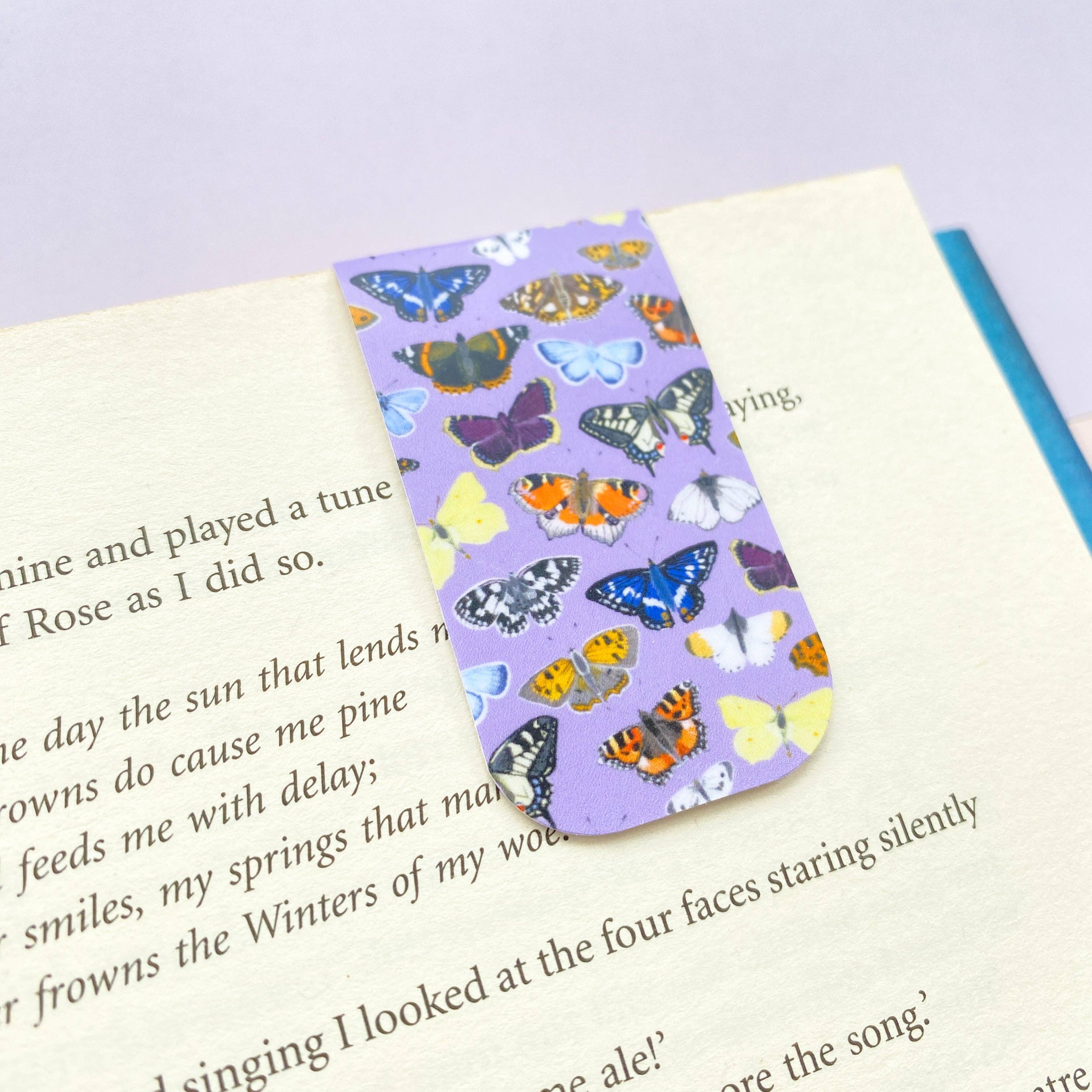 Butterfly magnetic bookmark with lilac background and illustrated butterflies