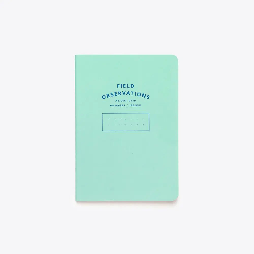 A6 dot grid notebook in blue with stitched binding