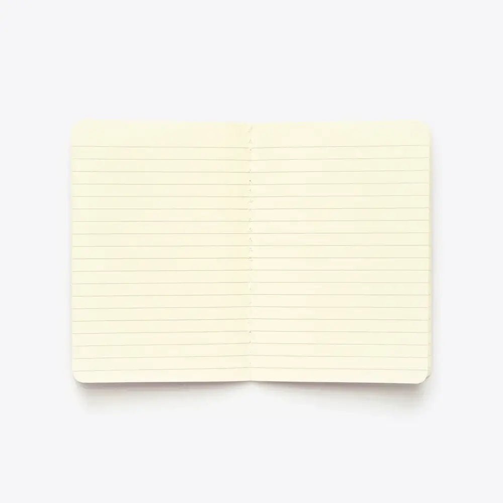 Open lined A6 notebook in pink with stitched binding