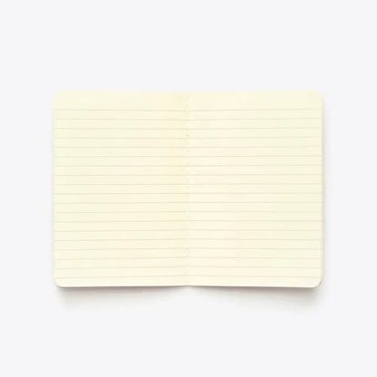 Open lined A6 notebook in pink with stitched binding