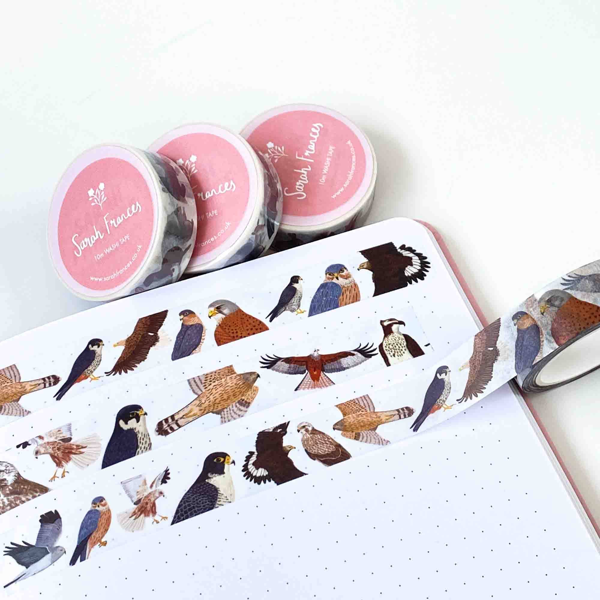 Bird-themed stickers on a notebook with pink containers labeled 'Sarah Frances'.