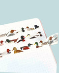 open notebook with washi tape featuring british duck illustrations