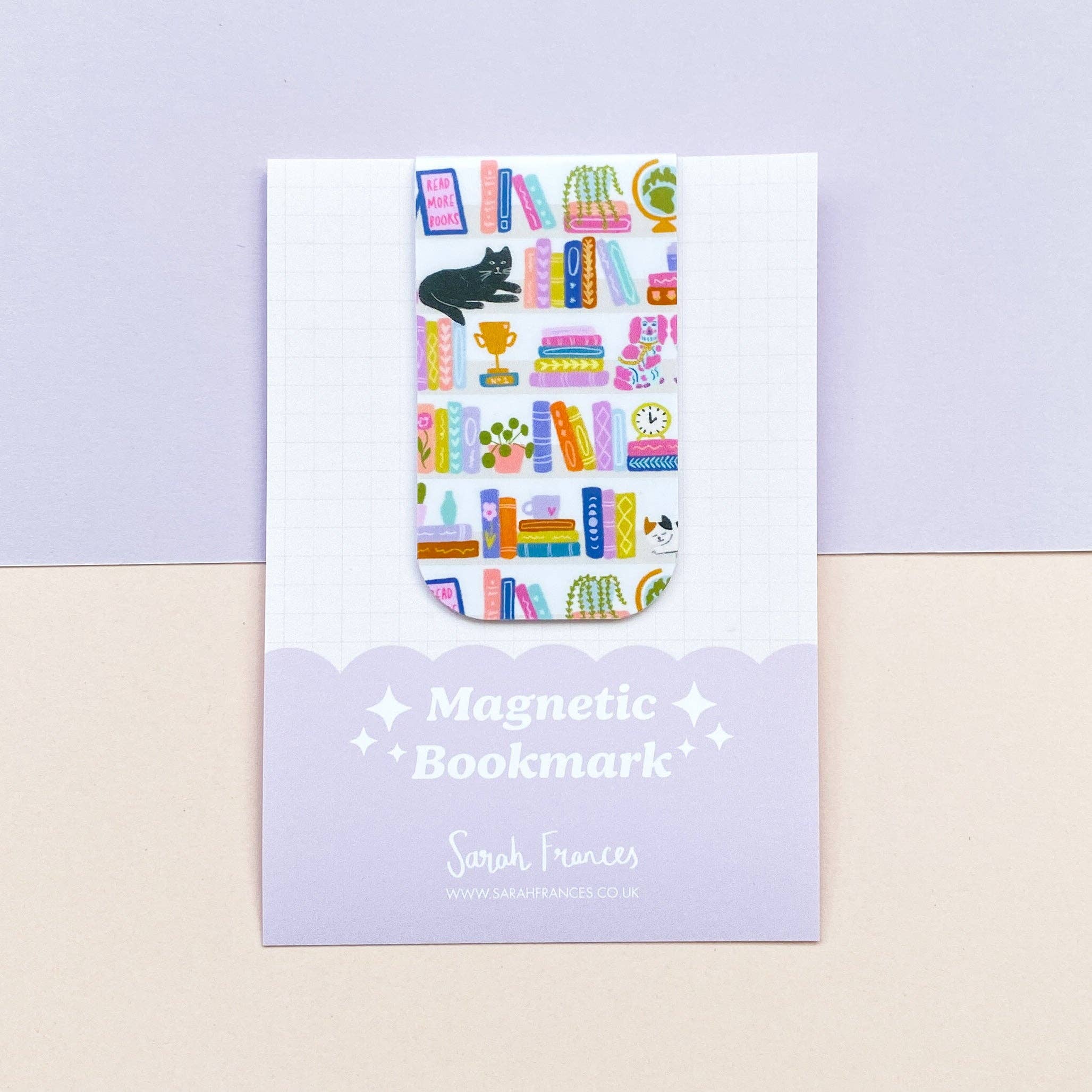 Magnetic bookmark packaging with colorful illustrations on a light purple background