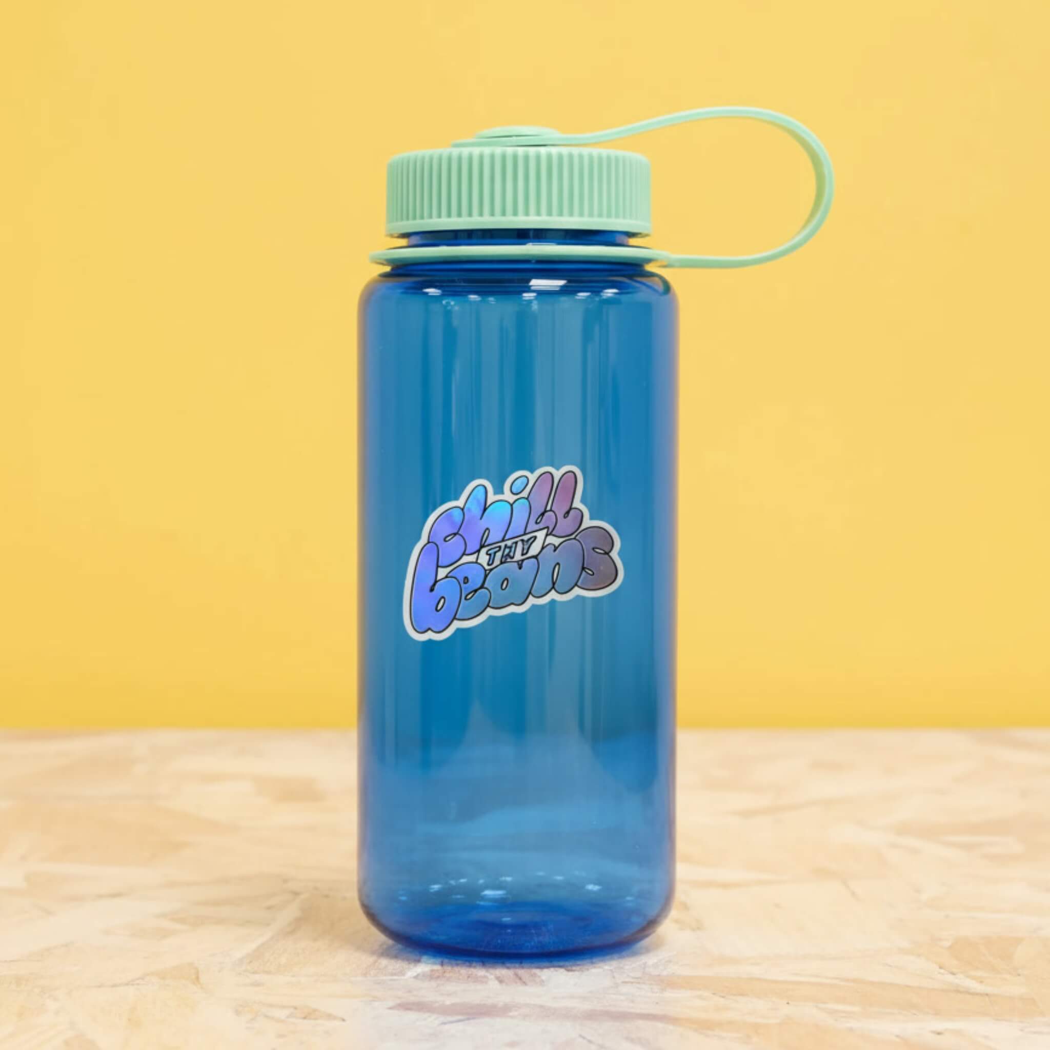 Clarice Tudor Chill Thy Beans holographic vinyl sticker on water bottle