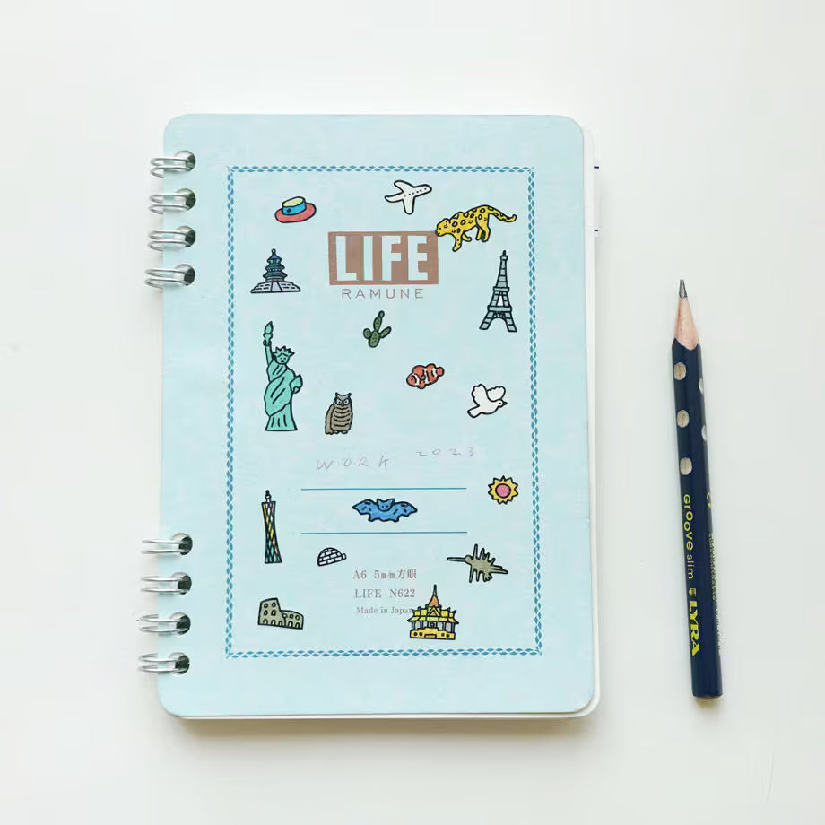 Zero Per Zero illustrated travel sticker sheet on notebook