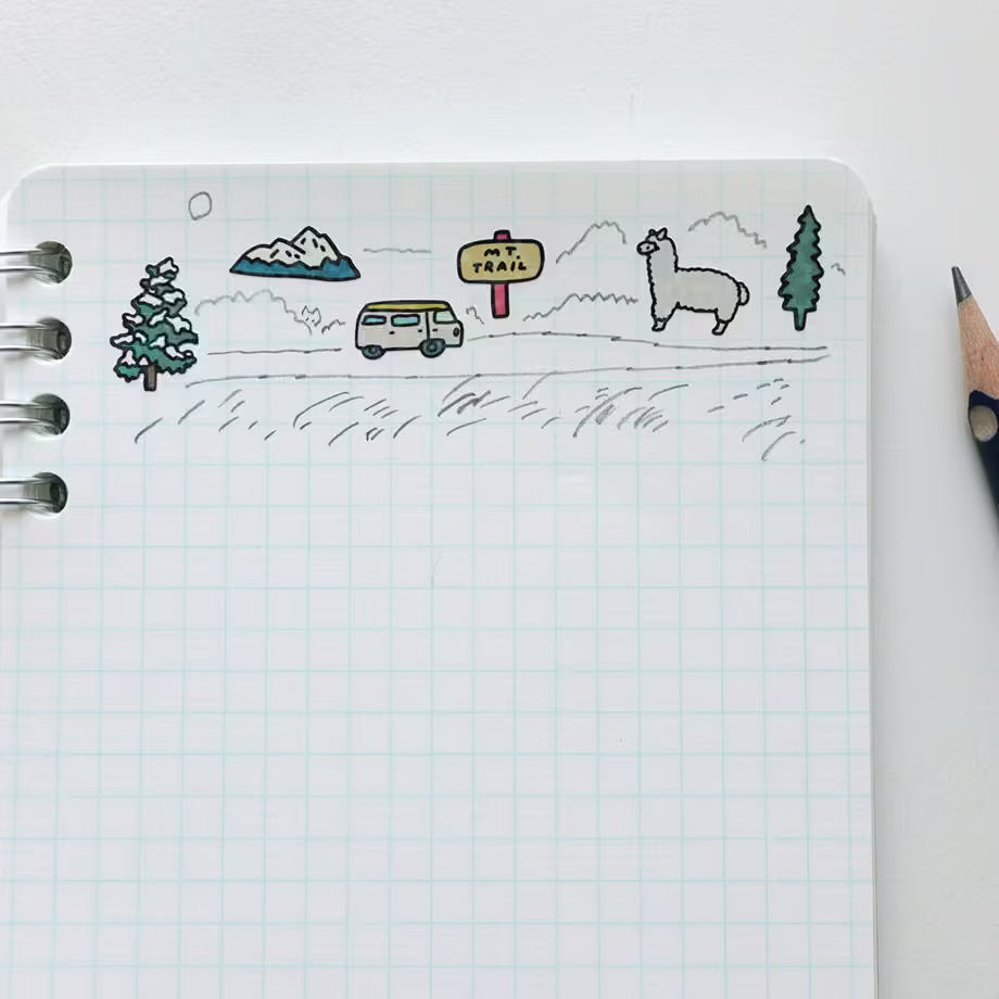 Illustrated travel sticker sheet set in use