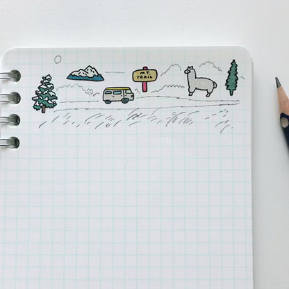 Illustrated travel sticker sheet set in use