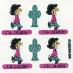 Close-up of holographic Peanuts Lucy stickers showing iridescent shine