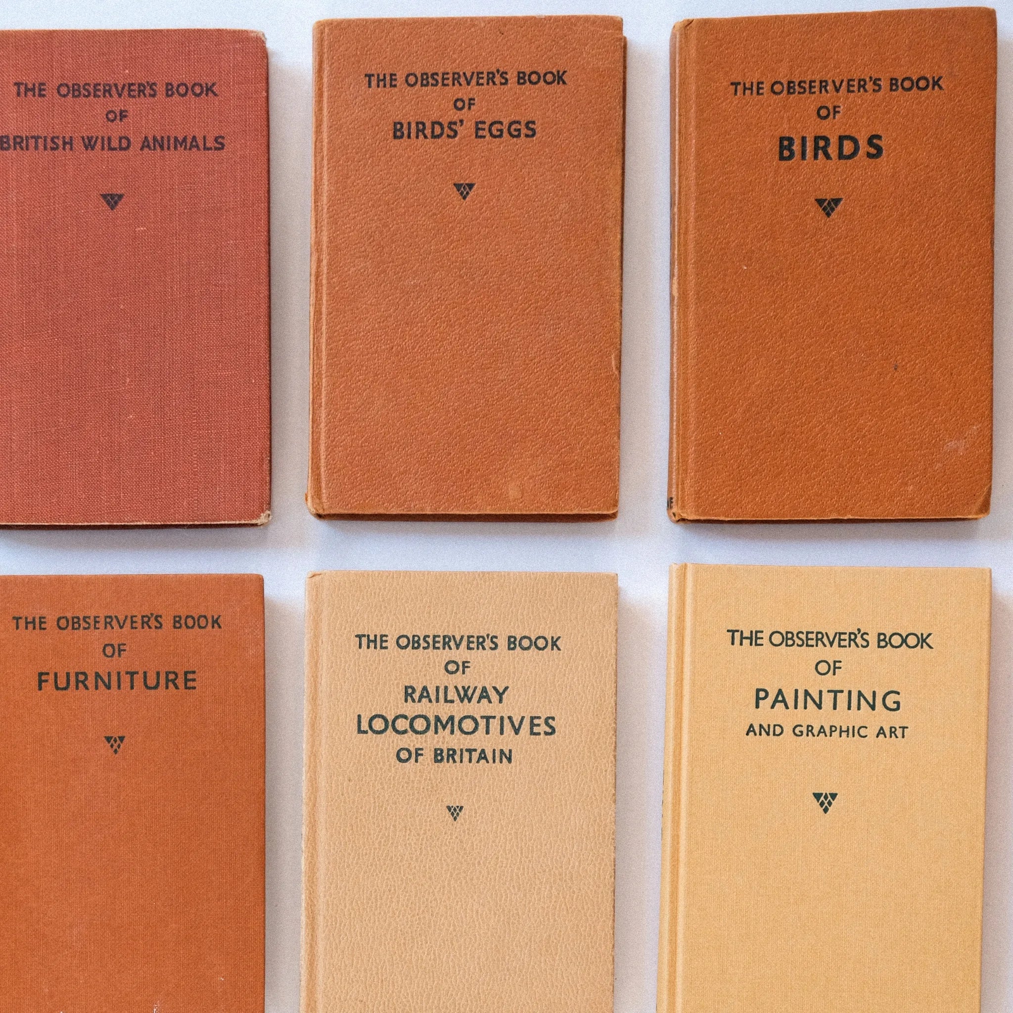 Collection of vintage books titled 'The Observer's Book' on a white background