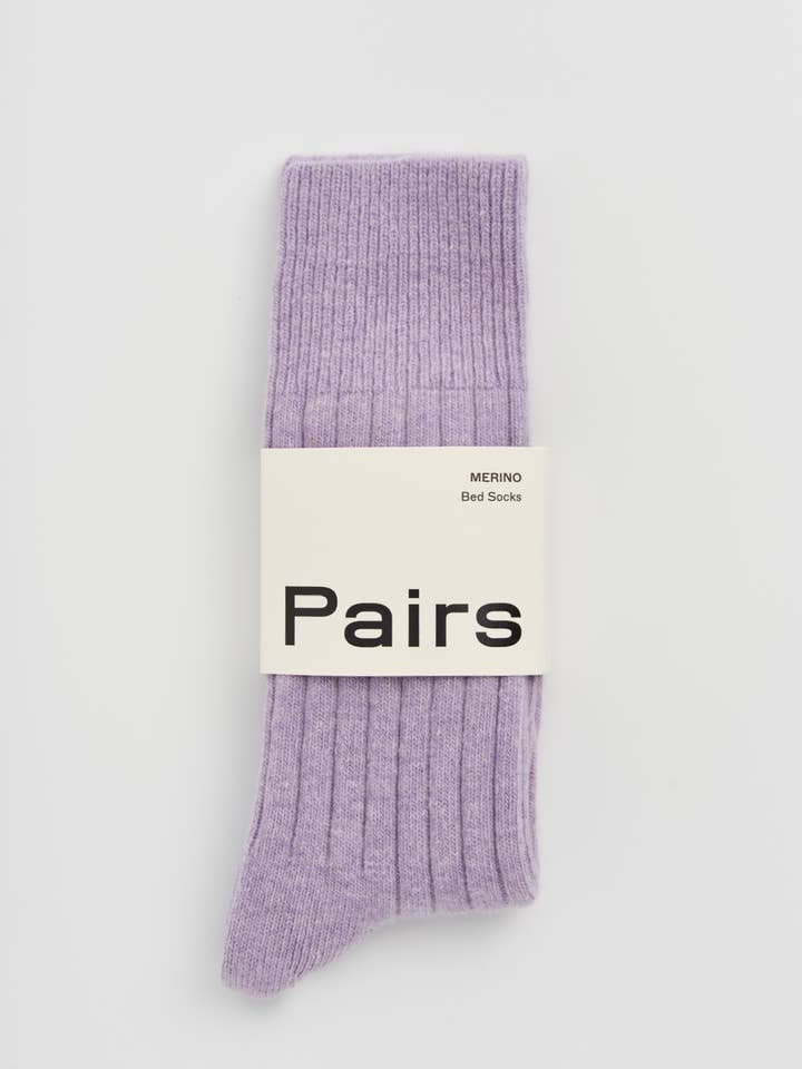 Purple sock on a white background with 'Pairs' label