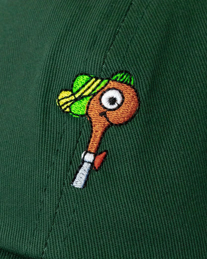 Embroidered design of lowly worm wearing a hat on a green background