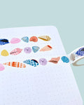 colourful sea shells washi tape design on notebook paper