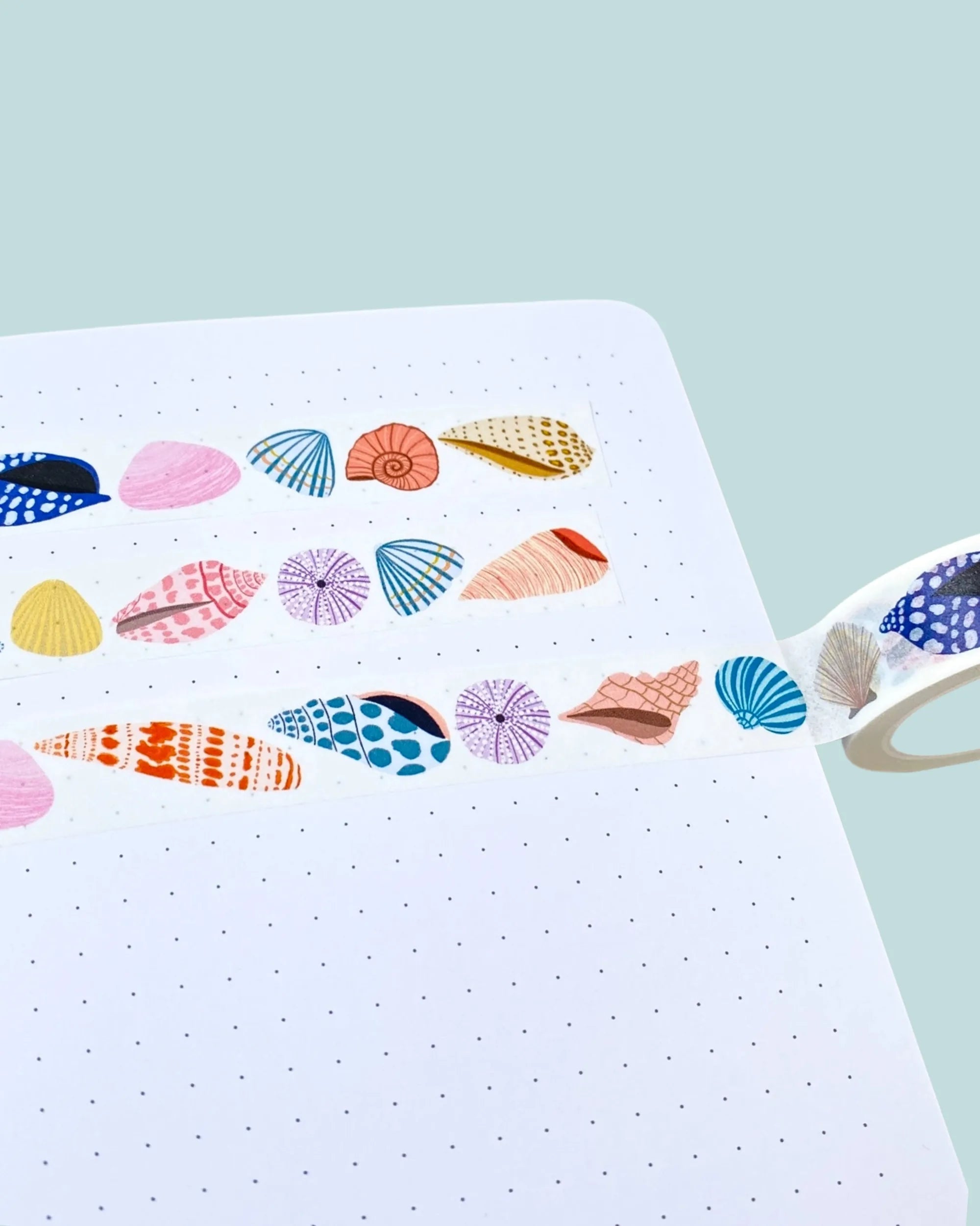 colourful sea shells washi tape design on notebook paper