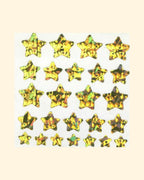 Star-shaped stickers with holographic pattern on a beige background