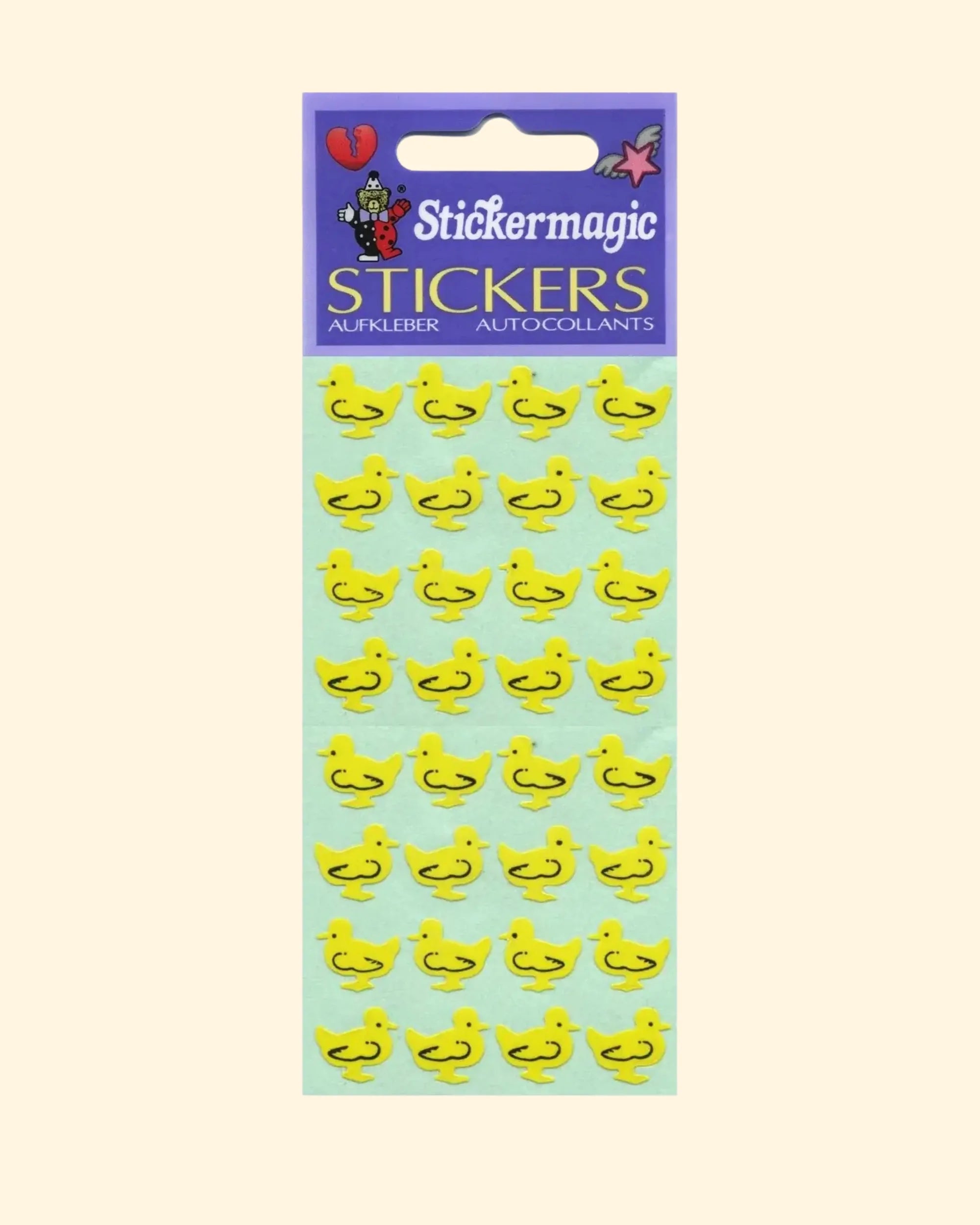 Pack of yellow duck stickers with 'Stickermagic' branding on a light blue background