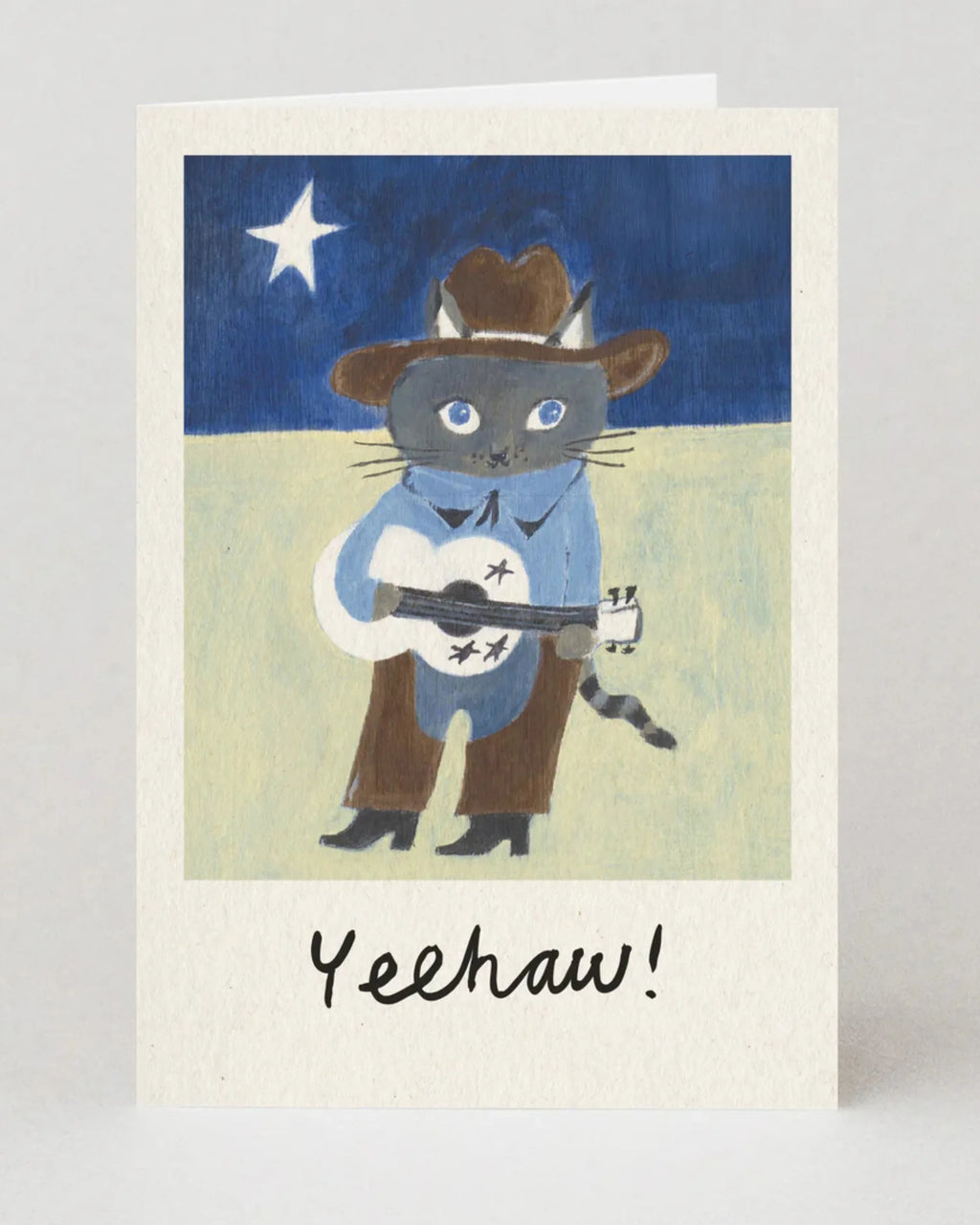 Card with a cat wearing a cowboy hat and boots, holding a guitar, with 'Yeehaw!' text on a starry night background.